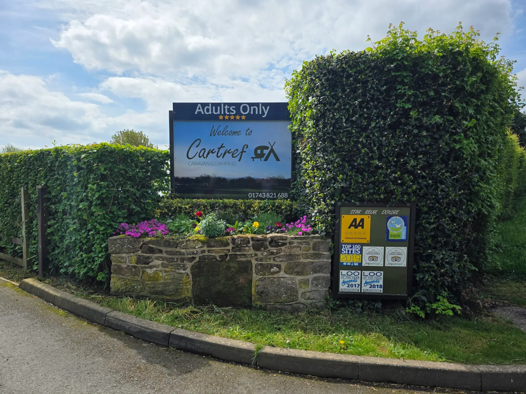 Entrance sign for Cartref Caravan and Camping Site in Shropshire