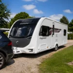 British caravan reversing onto a campsite pitch