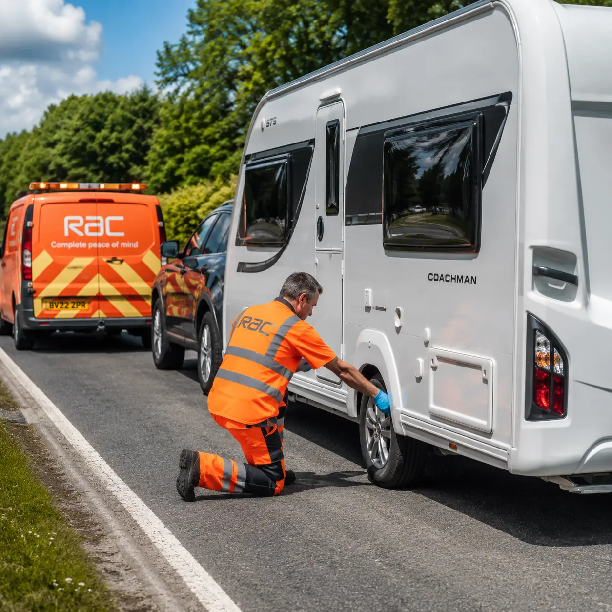 Breakdown technician inspecting a touring caravan