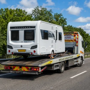 Specialist vehicle recovering a caravan