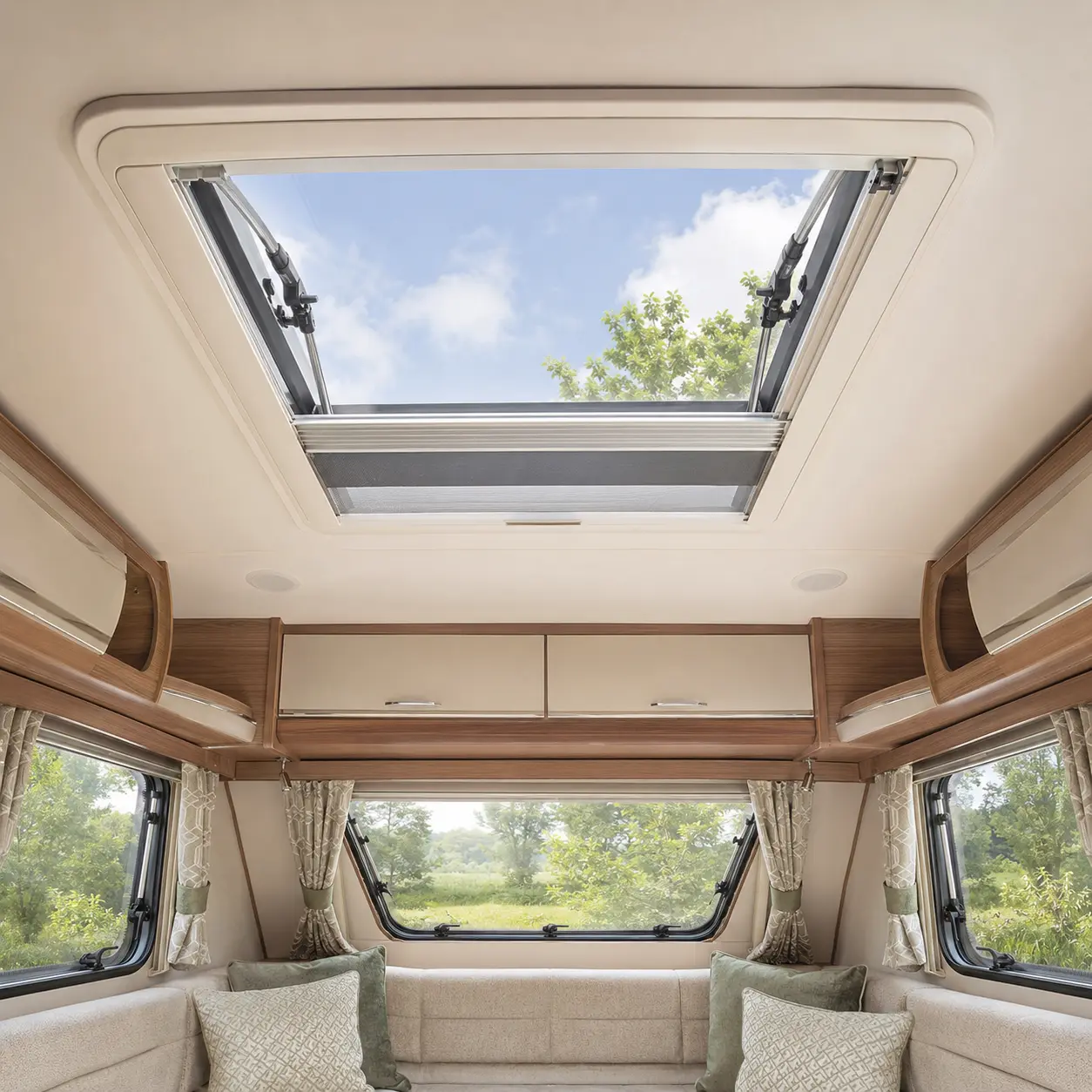 Open caravan rooflight providing ventilation inside a touring caravan